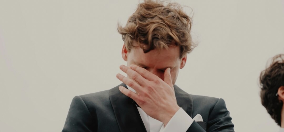 businessman in suit looking worried